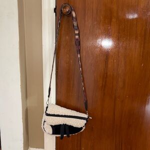 Shearling Saddle Crossbody Bag in Cream and Black